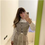 Studentessa offre lezione di italiano